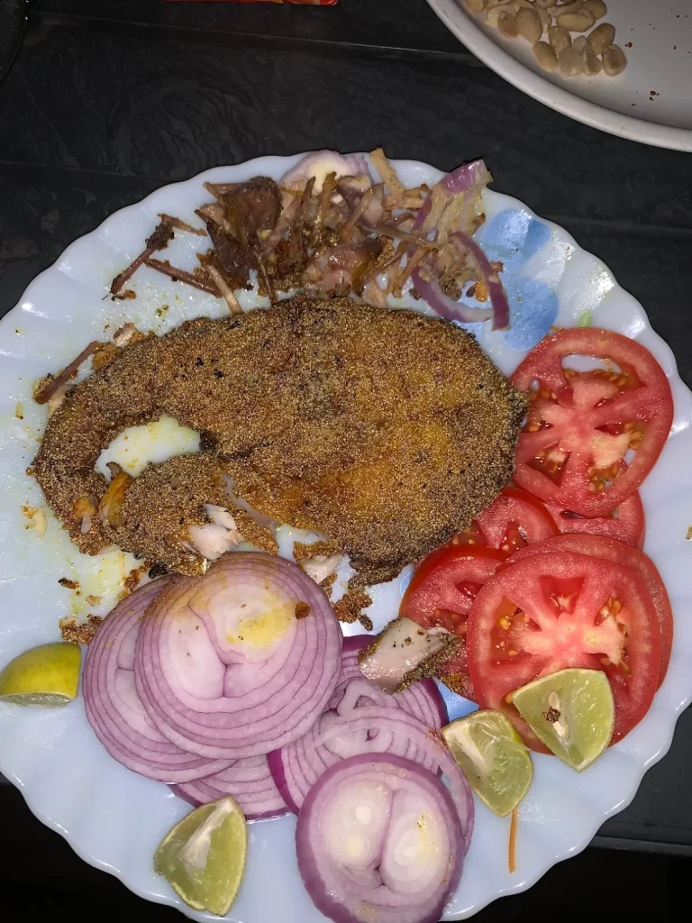 Luxurious Services Modern Amenities 5 Delicious Surmai fish fry served with onions and tomatoes at Misty Palace Villa Lonavala