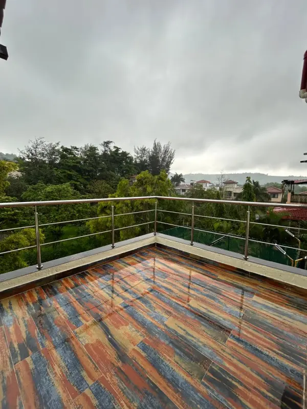 Private balcony with scenic hill view at Misty Palace Villa