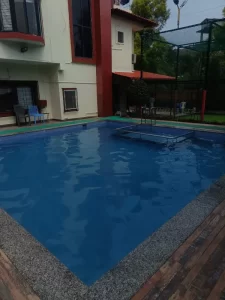 Unwind in Nature: The Ultimate luxury private villa stay in Lonavala 1 Lonavala Luxury Private Villa Stay in Lonavala with villa architecture in the backdrop - Misty Palace Villa,
