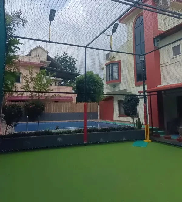 Synthetic turf area next to pool at Misty Palace Villa on the Lonavala travel blog page 