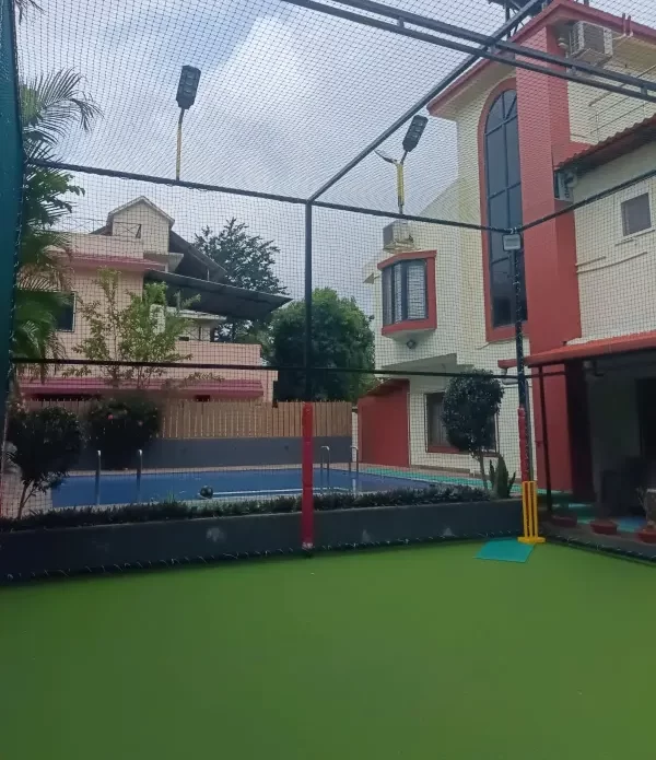 Synthetic turf area next to villa and pool - About page Misty Palace Villa, Lonavala